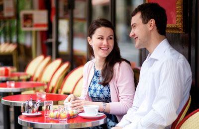 Mini Cruise to Amsterdam with P&O Ferries Couple enjoying a coffee in Amsterdam